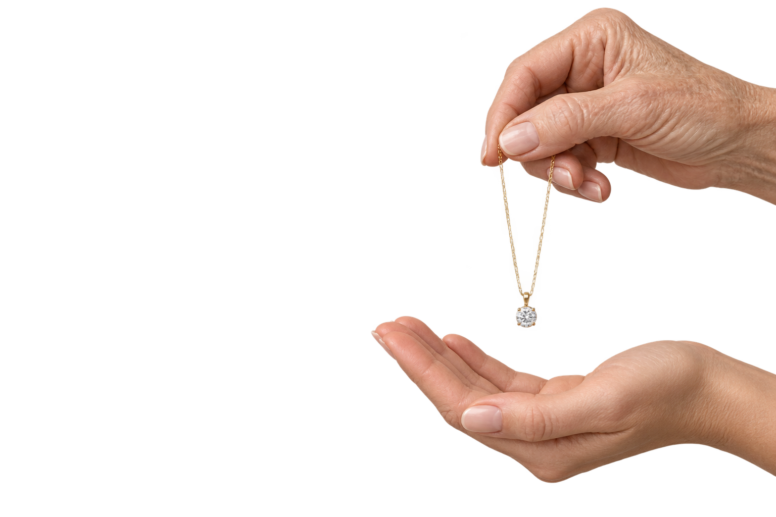 An older hand passing a diamond pendant to a receiving hand, both entering from the right edge.